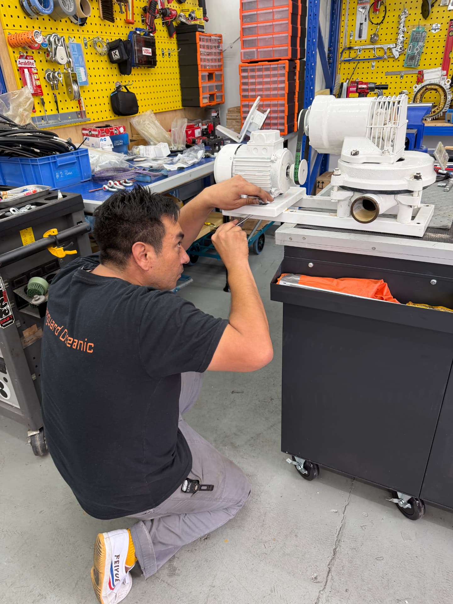 VO Marine engineer overhauling a pump unit in the Hong Kong workshop