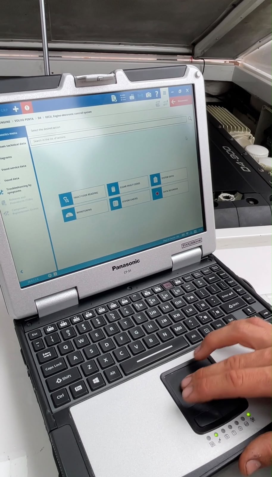 Diagnostic menu showing fault code reading, system checks and data recorder options